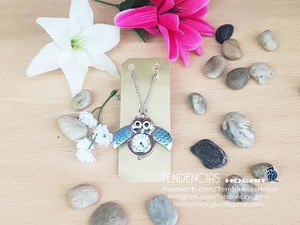 Reloj búho azul abierto