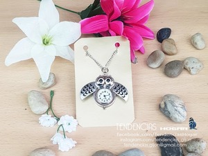 Reloj búho negro abierto