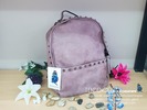 Mochila símil piel rosa